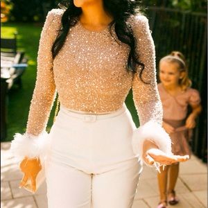 Selling the Nadine Merabi Amelia jumpsuit. I wore it once for my bridal shower.